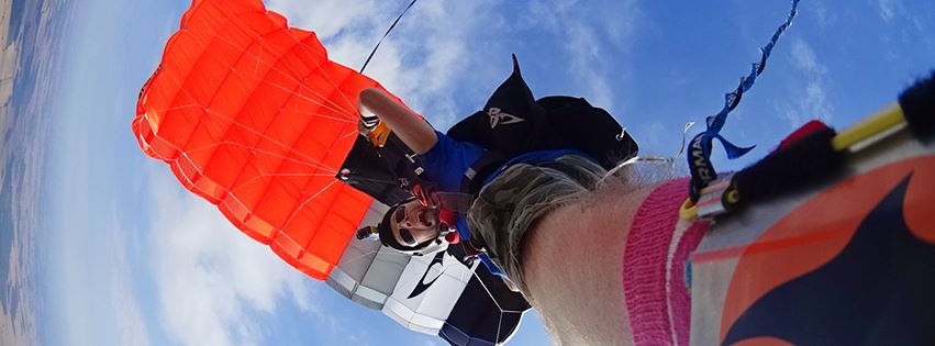 A shoe mounted, Go-Pro photo of James 'Macca' Macdonald under parachute.