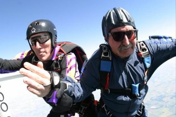 Adam Schmucker jumps with his Dad, Cliff.