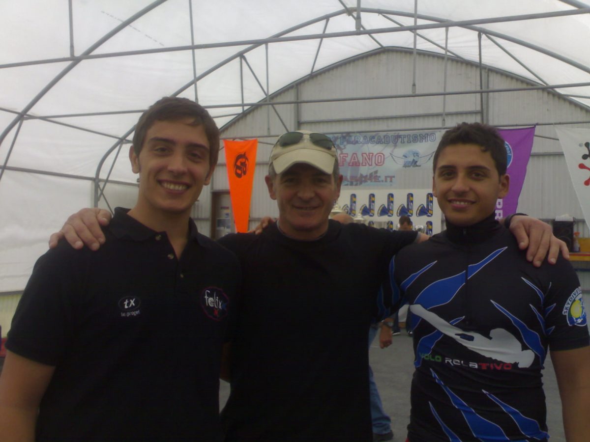 The Fattoruso brothers take a picture with their Dad.