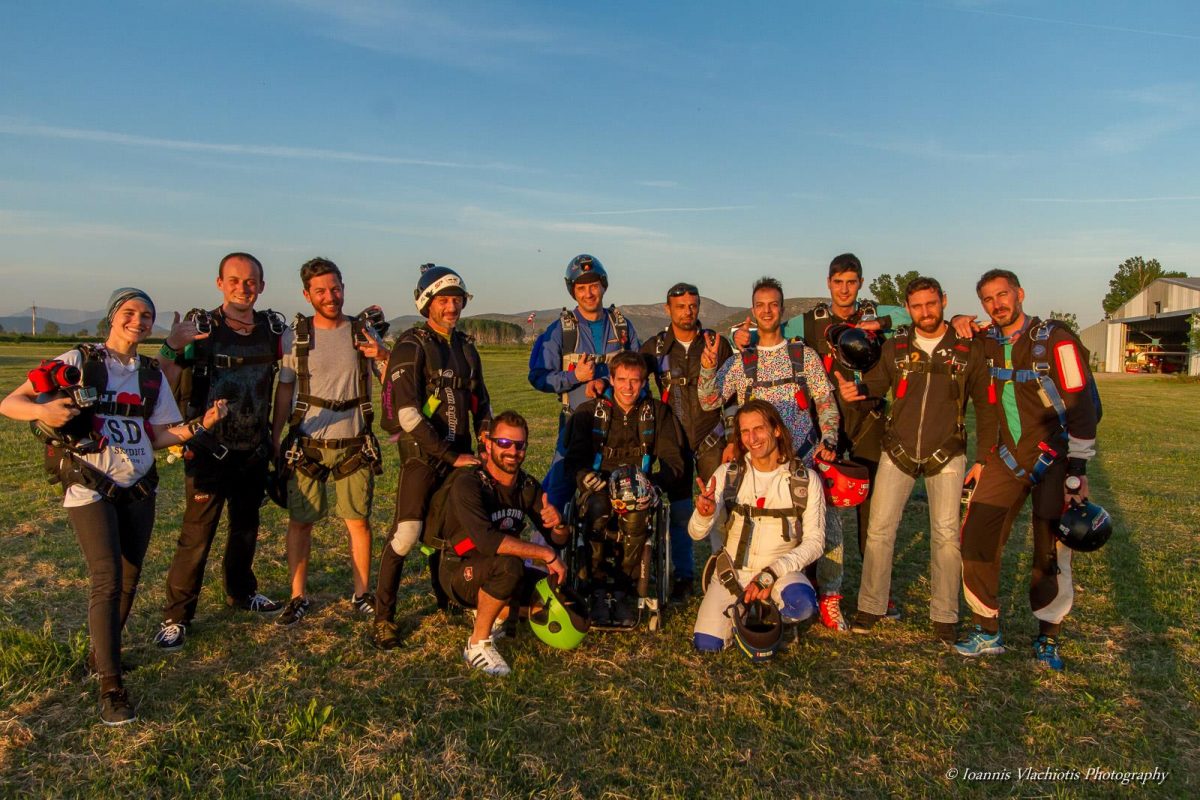 Posing with a group after a skydive