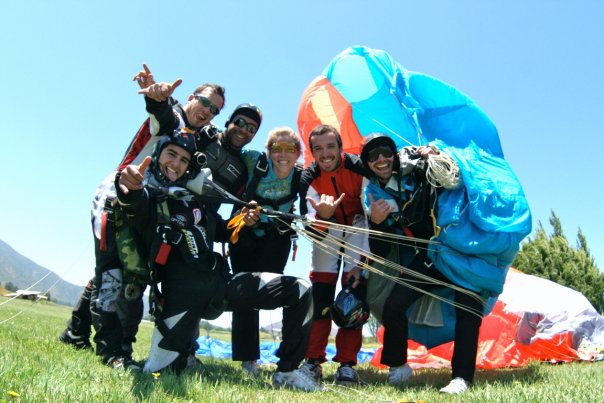 Eugenio smiles with his friends at Skydive Andes