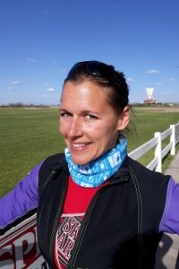 Chazi smiling in the spectator area at Skydive Arizona