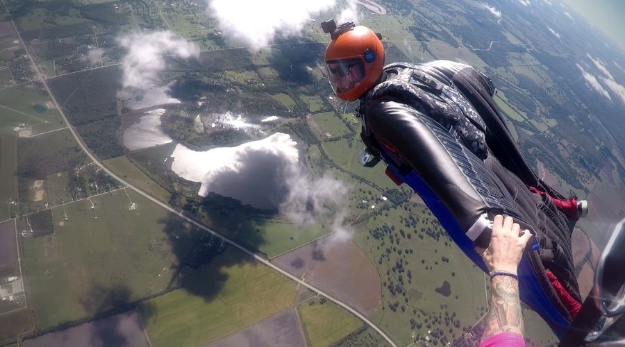 Alex flocking on a wingsuit jump