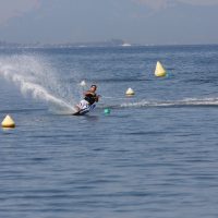 Omar slalom water skiing throwing up some spray!