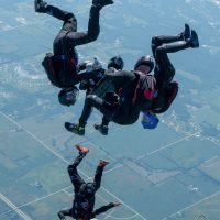 SDC Core turn points thousands of feet in the air abovec Skydive Chicago