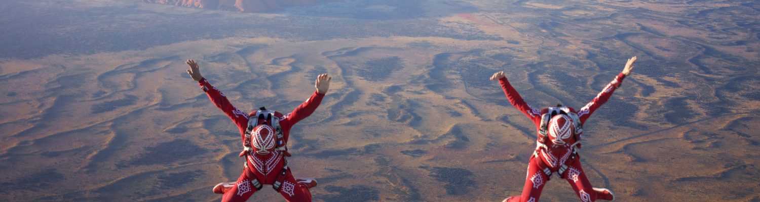 Team Air Wax photographed flying thousands of feet above Ayers Rock in Australia