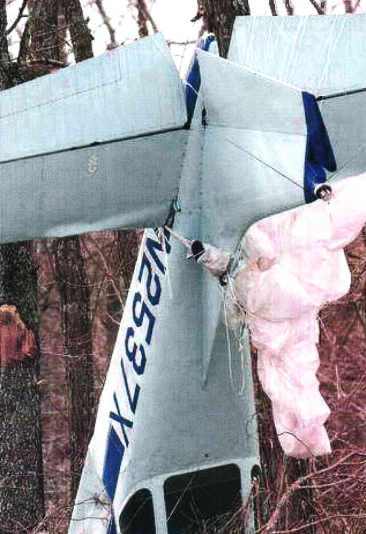 crashed plane after opening of a reserve container inside the plane